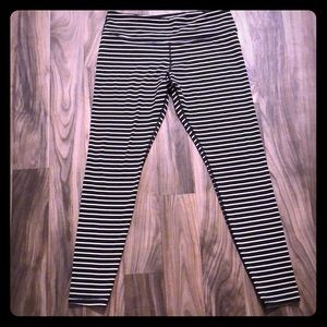Scorpio Sol black & white strip workout pants
